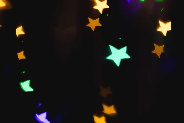 Flerfärgad Stjärna Bokeh Ljus Med Kopia Utrymme Mörk Bakgrund Ljus — Stockfoto
