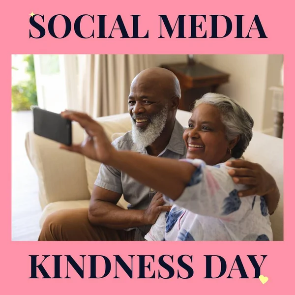 Composite Social Media Kindness Day Text Diverse Couple Using Smartphone — Stock Photo, Image