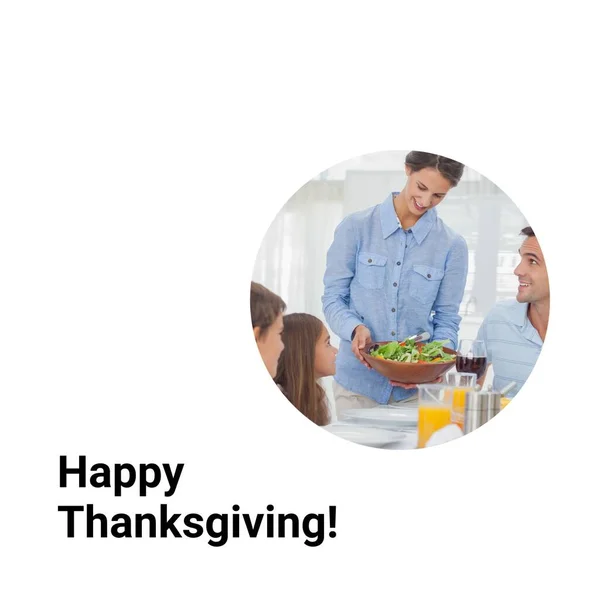 Happy thanksgiving day text with happy caucasian mother serving family at dinner table. Thanksgiving, harvest festival, american tradition, family and autumn celebration digitally generated image.