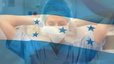Hastanede cerrahi maske takan beyaz kadın cerrahlara karşı Honduras bayrağı sallama animasyonu. Tıbbi sağlık ve vatanseverlik kavramı