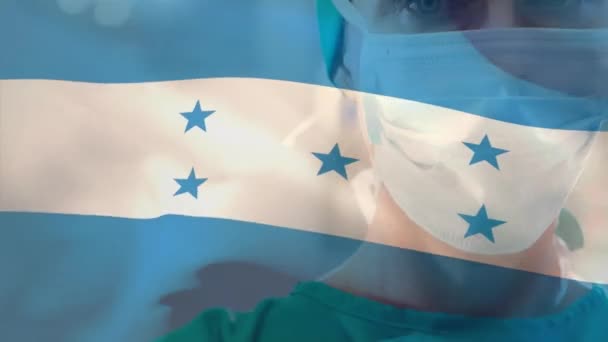 Animation Drapeau Honduras Agitant Contre Portrait Chirurgienne Caucasienne Hôpital Concept — Video