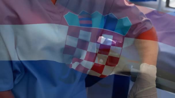 Animatie Van Kroatische Vlag Portret Van Een Blanke Vrouwelijke Chirurg — Stockvideo