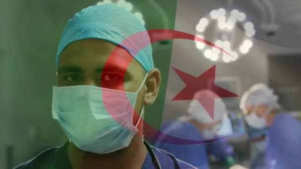 Animace Vlající Alžírské Vlajky Nad Portrétem Biraciálního Chirurga Chirurgické Masce — Stock video