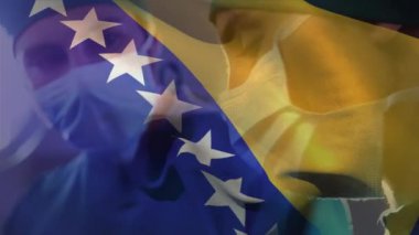 Çeşitli erkek ve kadın cerrahlar ameliyat yaparken Bosna ve Herzegovina bayrağının animasyonu. Tıbbi sağlık ve vatanseverlik kavramı