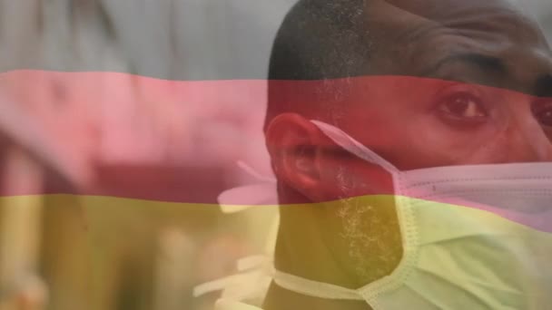 Animation Waving Germany Flag Close African American Man Face Mask — Stock Video