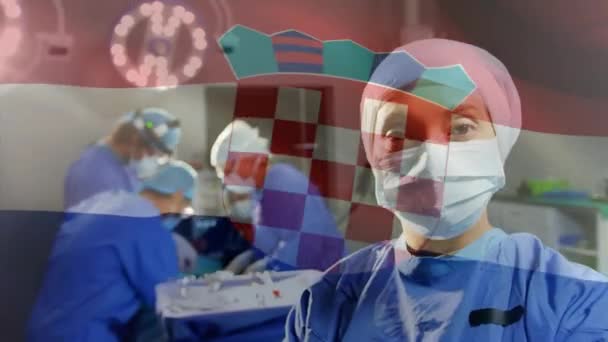 Animatie Van Kroatische Vlag Tegen Portret Van Biraciale Vrouwelijke Chirurg — Stockvideo