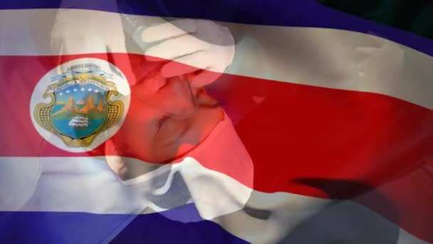Анимация Размахивания Флагом Коста Рики Над Доктором Надевающим Кислородную Маску — стоковое видео