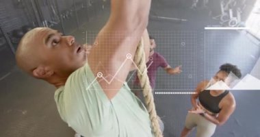 Beyaz adamın bacakları üzerinde arayüzdeki verilerin animasyonu ip tırmanma, spor salonunda çapraz eğitim. Fitness, egzersiz, güç, veri, dijital arayüz ve dijital olarak üretilen video.