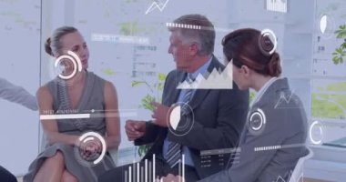 Animation of financial data processing over diverse business people in office. Global business, finances, computing and data processing concept digitally generated video.