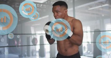 Afrika kökenli Amerikalı erkek boksörün ringde yumruk denemesi üzerine grafik simgelerinin canlandırılması. Dijital bileşik, çoklu pozlama, rapor, iş, spor ve yarışma konsepti.