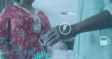 Afro-Amerikan çiftin el ele tutuşması üzerine grafiklerin ve ikonların animasyonu. Dijital bileşik, çoklu pozlama, rapor, iş, büyüme, aşk, birliktelik, tıbbi ve sağlık konsepti.