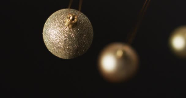 Video Gold Baubles Christmas Decorations Copy Space Black Background Christmas — Stock Video