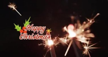 Siyah arka planda yanan maytapla mutlu noel mesajlarının animasyonu. Noel, gelenek ve kutlama konsepti dijital olarak oluşturuldu.