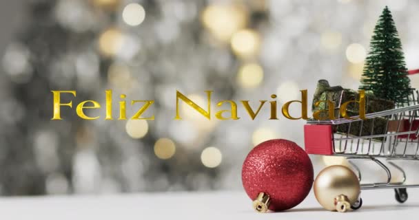 Feliz Navidad Testo Oro Sopra Albero Natale Nel Carrello Della — Video Stock