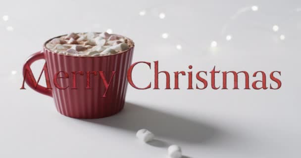 Feliz Natal Texto Vermelho Sobre Chocolate Quente Com Marshmallows Fundo — Vídeo de Stock