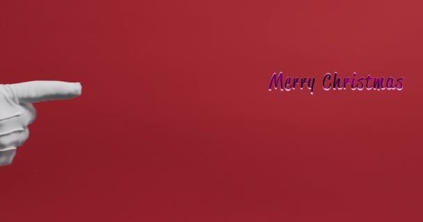 클로스의 빨간색 배경에 분홍색으로 즐거운 크리스마스 텍스트를 가리킨다 크리스마스 인사말 — 비디오