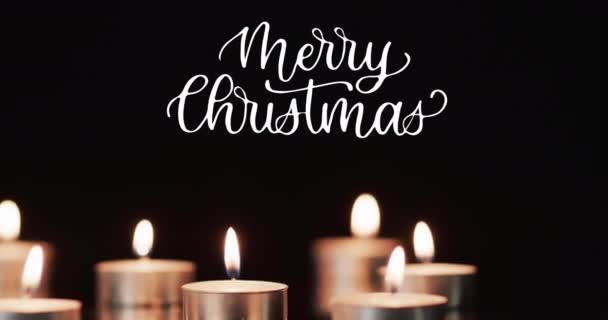 Animace Veselého Vánočního Textu Nad Zapálenými Čajovými Svíčkami Černém Pozadí — Stock video