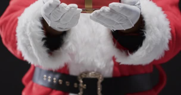 Feliz Navidad Testo Oro Sopra Sezione Centrale Natale Padre Possesso — Video Stock