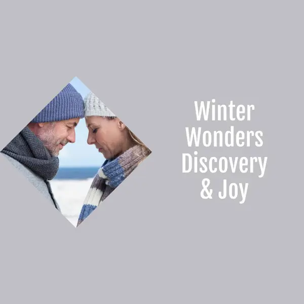 Composite of winter wonders discovery and joy text over happy caucasian couple in winter scenery. Winter, christmas, seasons and celebration concept digitally generated image.