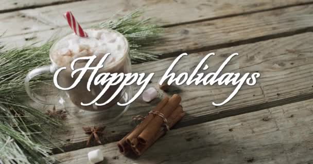 Happy Holidays Text White Christmas Hot Chocolate Cinnamon Sticks Wooden — Stock Video
