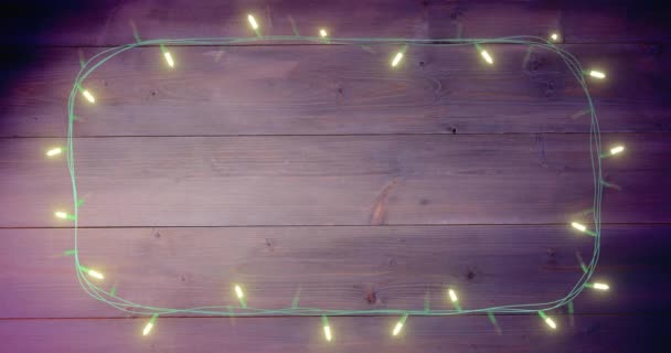 Animatie Van Flikkerende Elfenlichtjes Met Kopieerruimte Houten Ondergrond Kerst Traditie — Stockvideo