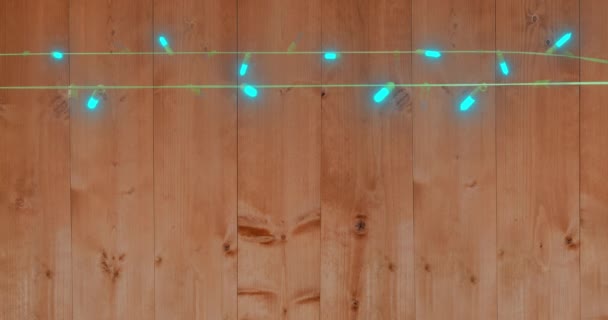 Animação Luzes Fadas Cintilantes Sobre Fundo Madeira Natal Tradição Conceito — Vídeo de Stock
