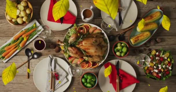 秋のアニメーションは感謝祭の夕食の背景を超えています 感謝祭 アメリカの伝統 お祝いのコンセプトデジタル生成ビデオ — ストック動画