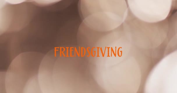 友谊文字的动画在点亮的褐色背景上 感恩节 美国传统和庆祝概念数字生成的视频 — 图库视频影像