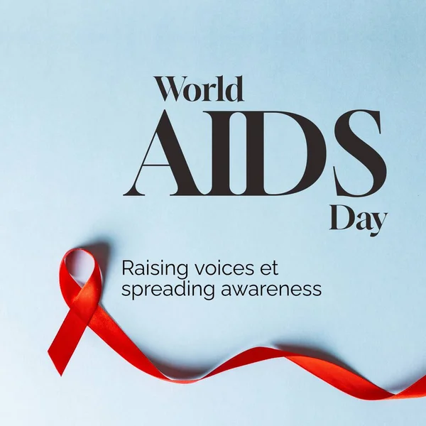 Composite of world aids day and red ribbon on blue background. World aids day, awareness and health concept digitally generated image.
