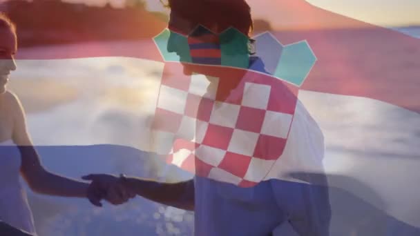 Vídeo Composto Acenando Bandeira Croácia Contra Casal Caucasiano Abraçando Uns — Vídeo de Stock