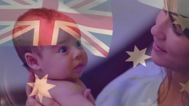 Composite Video Waving Australia Flag Happy Caucasian Mother Kissing Her — Stock Video