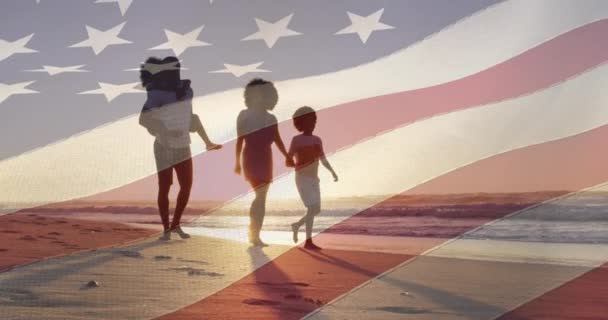 Animación Bandera Sobre Pareja Afroamericana Con Hijo Hija Playa Patriotismo — Vídeo de stock