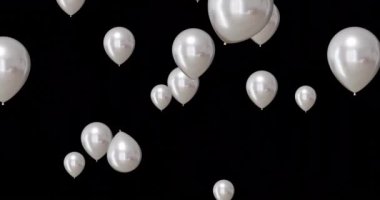 Siyah arka planda gümüş balon animasyonu. Yeni yıl, yeni yıl arifesi, gelenek ve kutlama konsepti dijital olarak oluşturulmuş video.