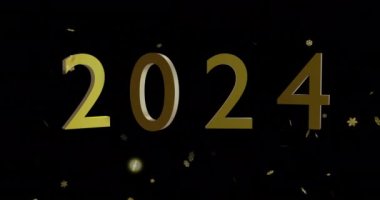 Siyah zemin üzerinde 2024 yazı ve altın yıldızının animasyonu. Yeni yıl, yeni yıl arifesi, gelenek ve kutlama konsepti dijital olarak oluşturulmuş video.