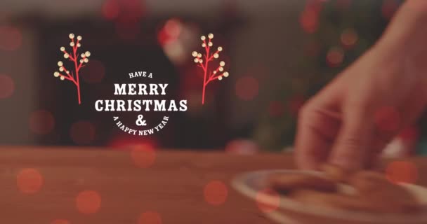Animacja Wesołych Świąt Szczęśliwy Tekst Noworoczny Przycięte Ręce Trzymając Ciasteczka — Wideo stockowe