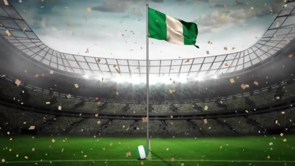 Animación Confeti Dorado Cayendo Sobre Ondeando Bandera Nigeria Contra Estadio — Vídeo de stock