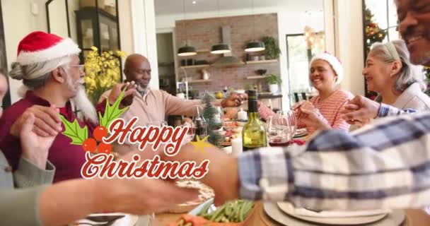 Animação Texto Natal Feliz Sobre Diversos Amigos Seniores Dizendo Graças — Vídeo de Stock