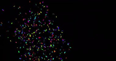 Siyah arkaplanda parti metni ve konfeti animasyonu. Yeni yıl, yeni yıl arifesi, kutlama ve geleneksel konsept dijital olarak oluşturulmuş video.