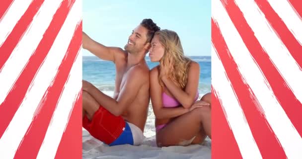 Amerika Bayrağının Yazın Plajda Beyaz Bir Çift Üzerinde Canlandırılması Usa — Stok video