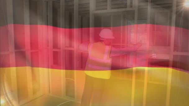 Animation Der Fahne Von Deutschland Die Über Einem Kaukasischen Ingenieur — Stockvideo