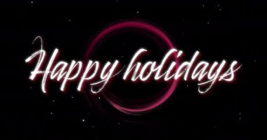 Mutlu bayramlar metni ve siyah arka planda ışık çemberi animasyonu. Noel, gelenek, kutlama hareketi ve dijital olarak üretilen renk konsepti.