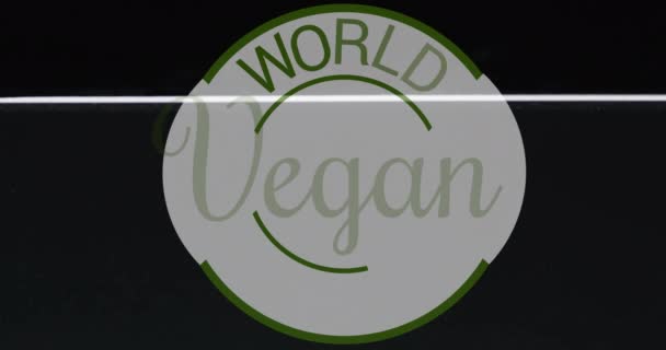 Animation Världen Vegan Dag Text Över Frukt Som Faller Vatten — Stockvideo