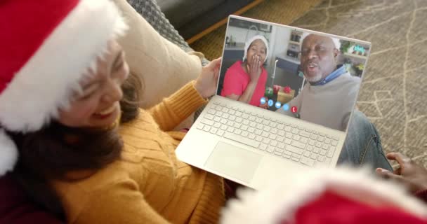 Happy Diverse Couple Senior Parents Having Christmas Laptop Video Call Royalty Free Stock Video