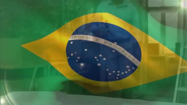 Animation Flag Brazil Waving Biracial Engineer Wearing Helmet Walking Blueprints — Stock Video