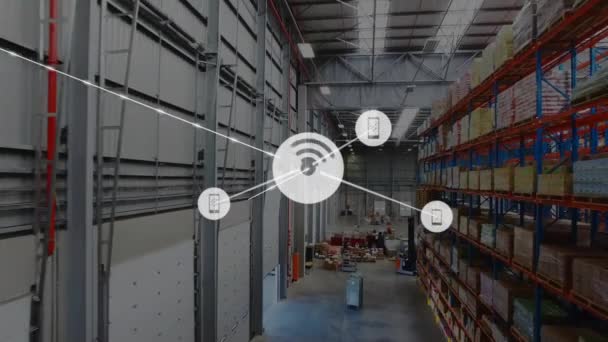 Animation of icons connected with lines over aerial view of warehouse. Digital composite, multiple exposure, communication, technology, shipping and distribution concept.