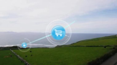 Gökyüzüne karşı yeşil manzara ve deniz üzerindeki çizgilerle bağlı ikonların animasyonu. Dijital bileşik, çoklu pozlama, iletişim, alışveriş, koruma, manzara, doğa, teknoloji.