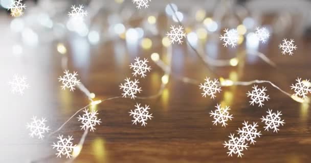 Animación Nieve Cayendo Sobre Luces Hadas Navideñas Navidad Festividad Celebración — Vídeo de stock