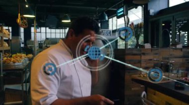 Kafkas erkek fırıncı üzerinden akıllı telefon kullanarak bağlantı ağının animasyonu. Küresel iş, yiyecek ve dijital arayüz kavramı, dijital olarak üretilen video.