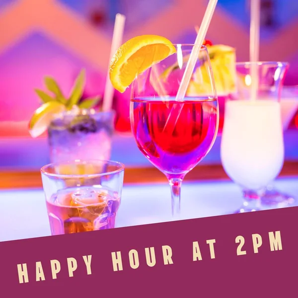 Composition of happy hour at 2pm text over colourful cocktails on countertop in bar. Party, celebration and happy hour concept digitally generated image.