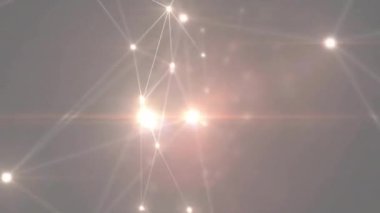 Çizgilerle bağlantılı noktaların canlandırılması ve gri arkaplanda hareket eden mercek parlamaları. Dijital olarak üretilmiş, hologram, illüstrasyon, aydınlanma, soyut ve iletişim konsepti.